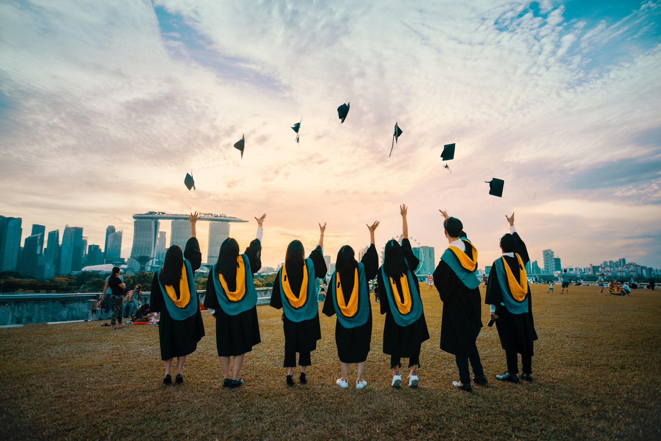 Graduates celebrating (placeholder photograph)